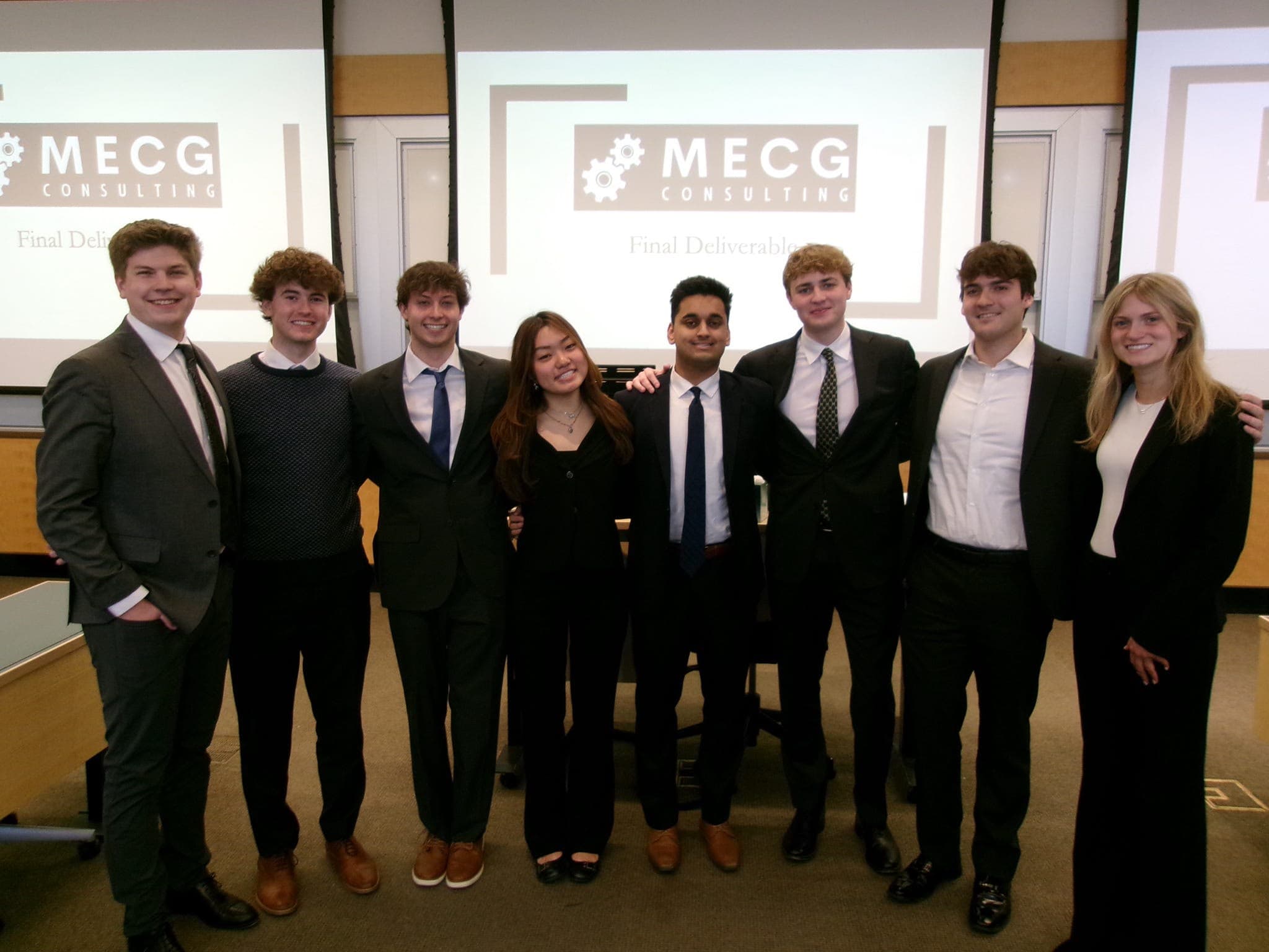 MECG members presenting together at a formal chapter event